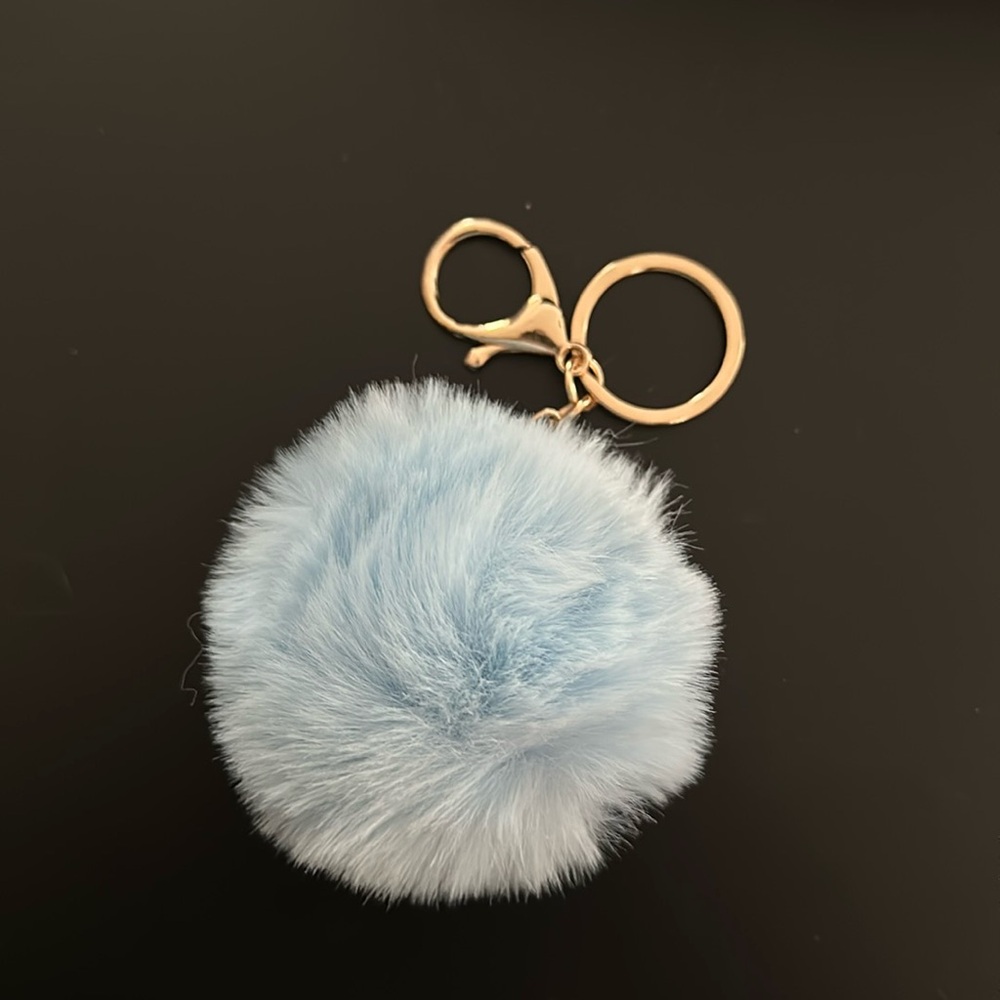 Baby blue with gold keychain. Puff ball - 5 in total